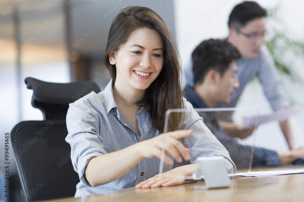 IT workers developing digital tablet