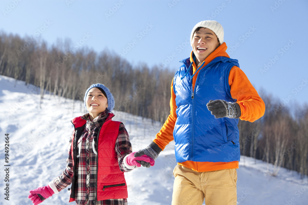 Happy young couple in ski resort