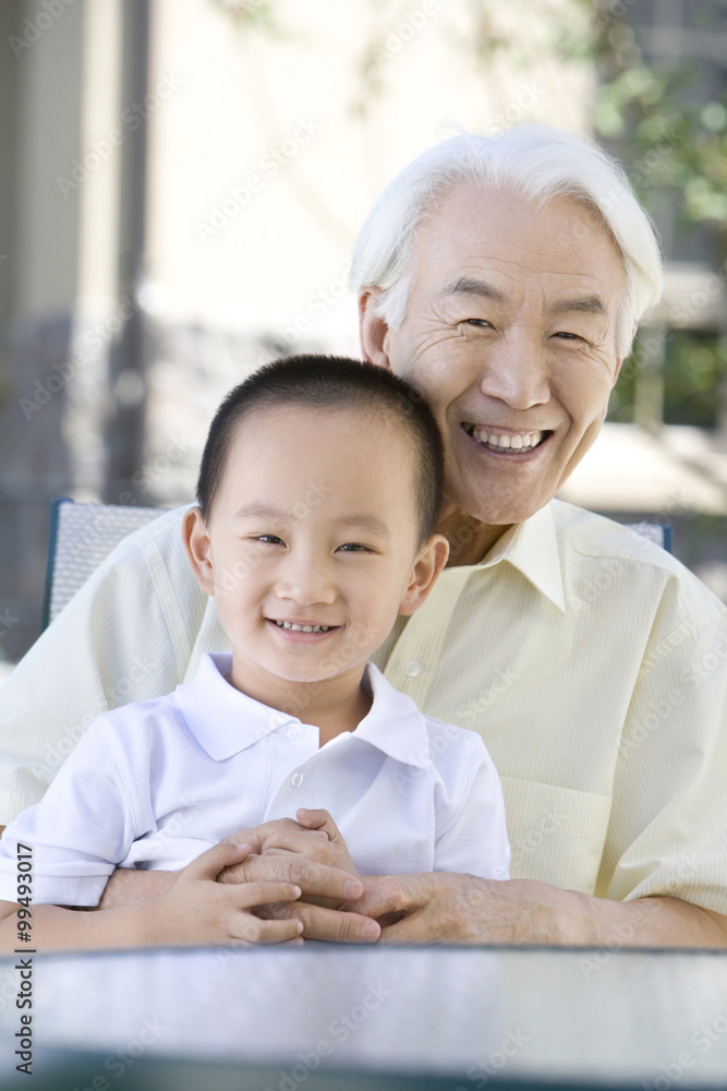 Portrait of grandfather and grandson