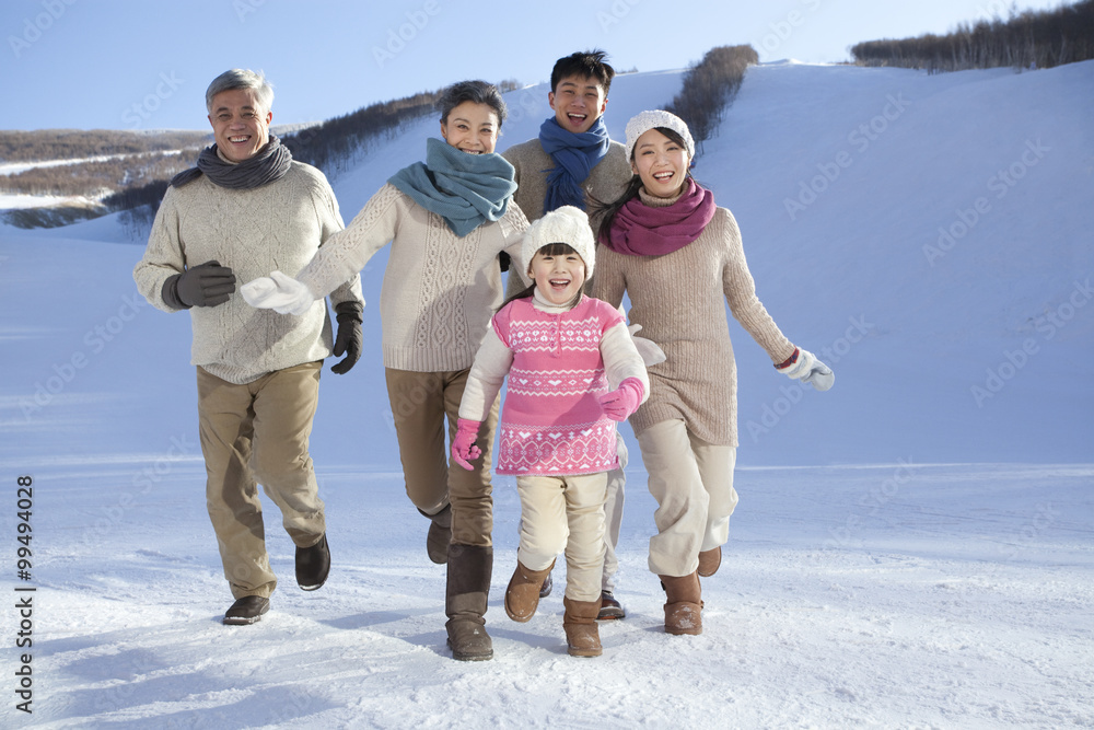 Family having fun in snow