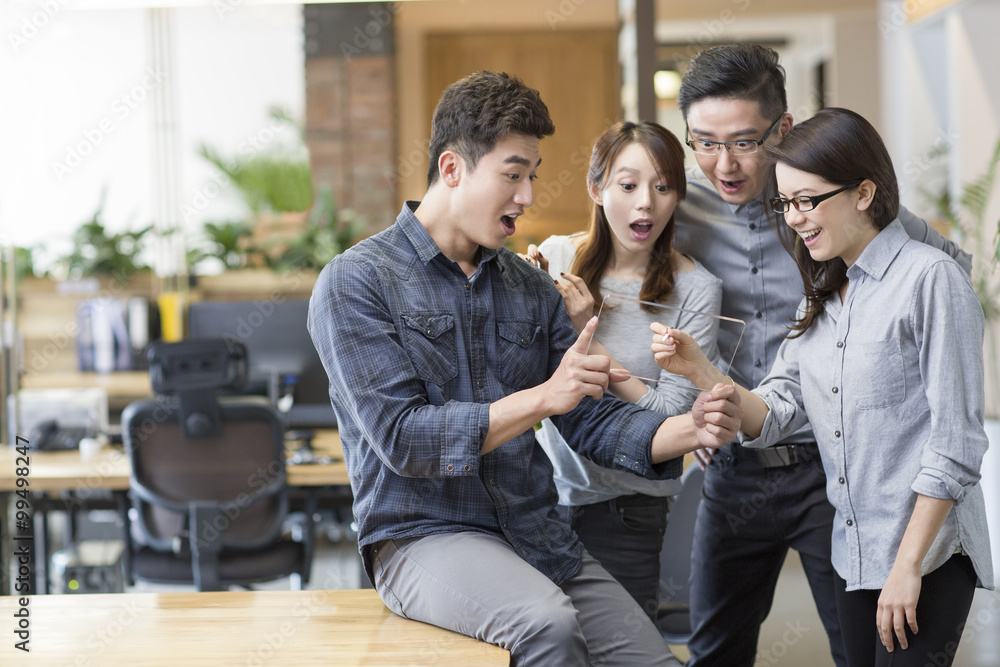 IT workers developing digital tablet