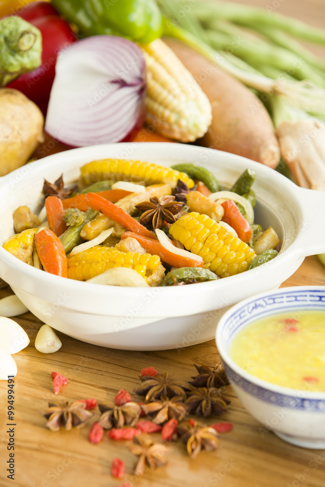 Assorted vegetables and cooked vegetable dish