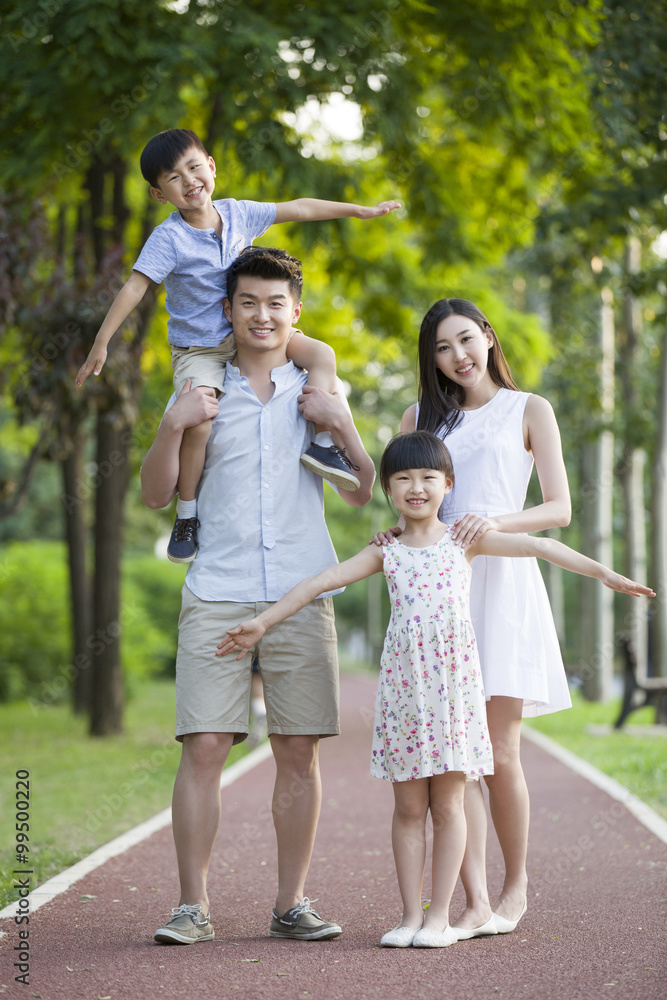 Portrait of happy young family