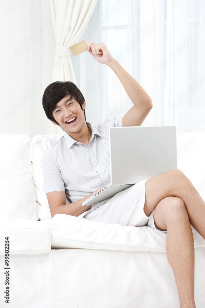 Man Online Shopping at Home