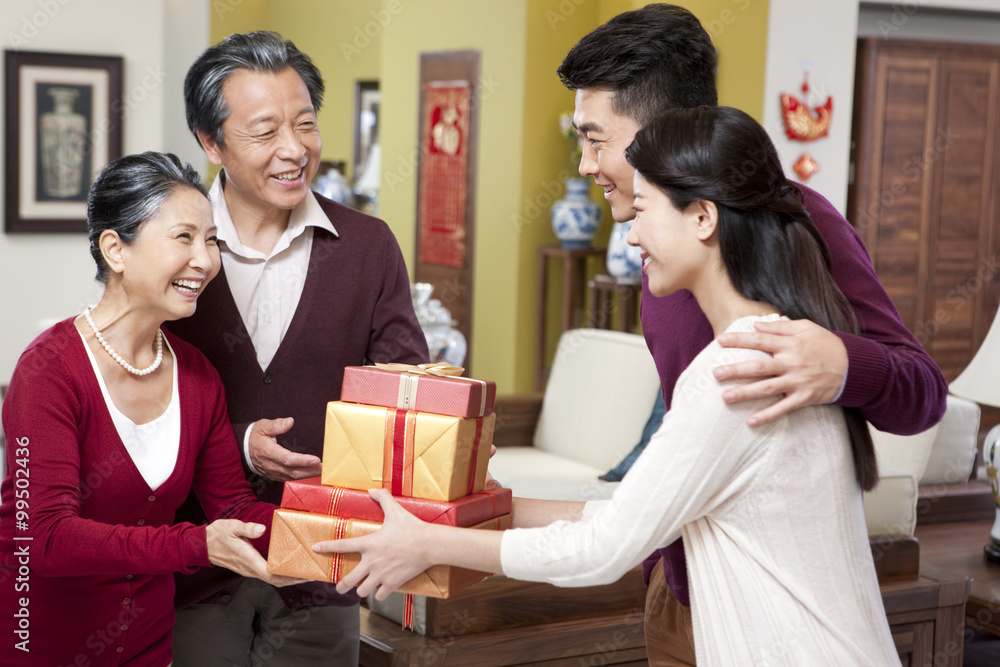 Family visiting with gifts during Chinese New Year