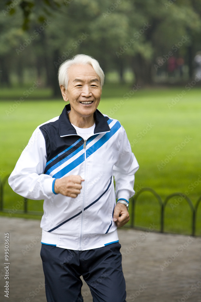 Senior Man Jogging in a Park