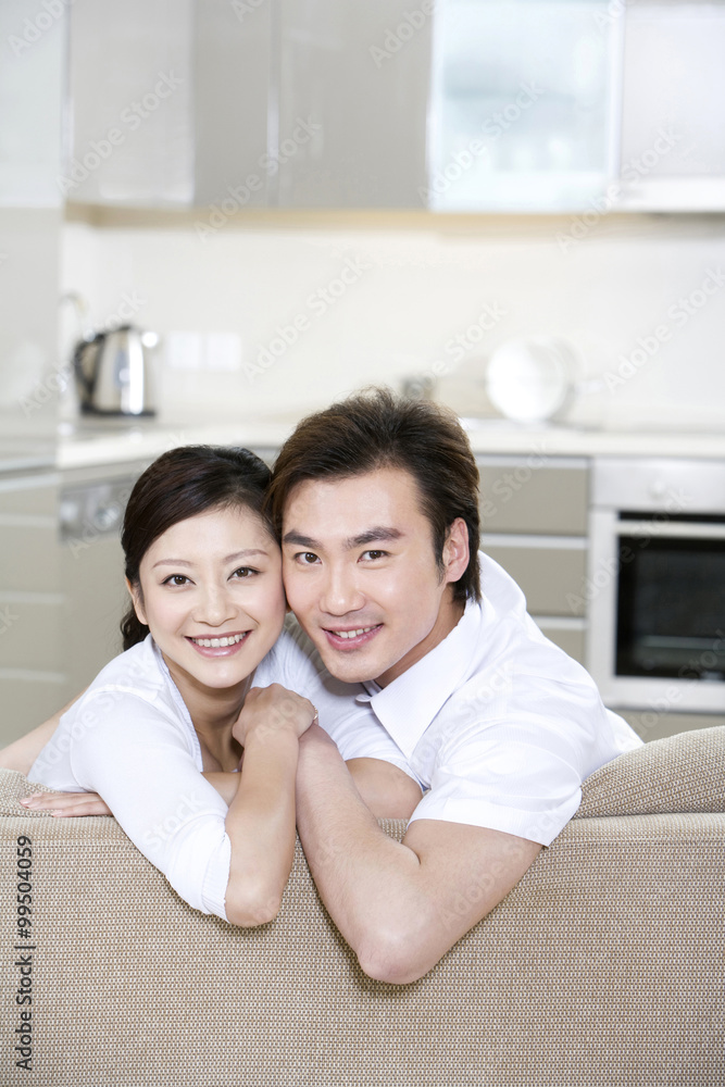 Portrait of a young couple at home