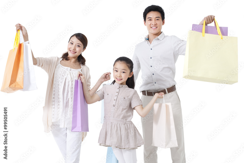 Family holding shopping bags