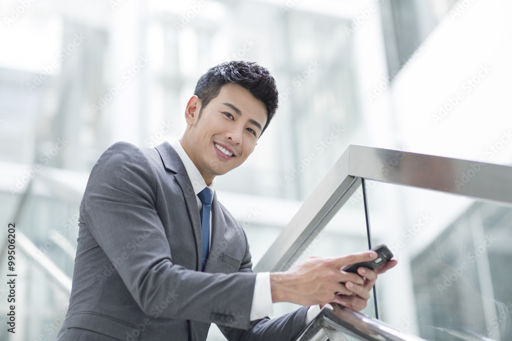 Businessman using smart phone