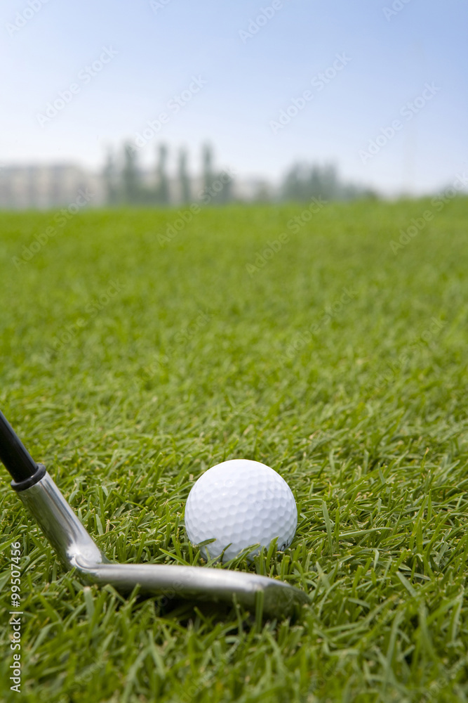 Close-up of chipping golf ball