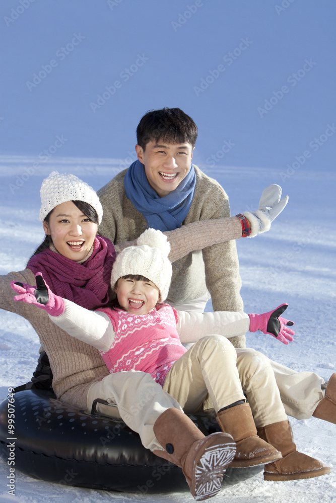 Family having fun in snow