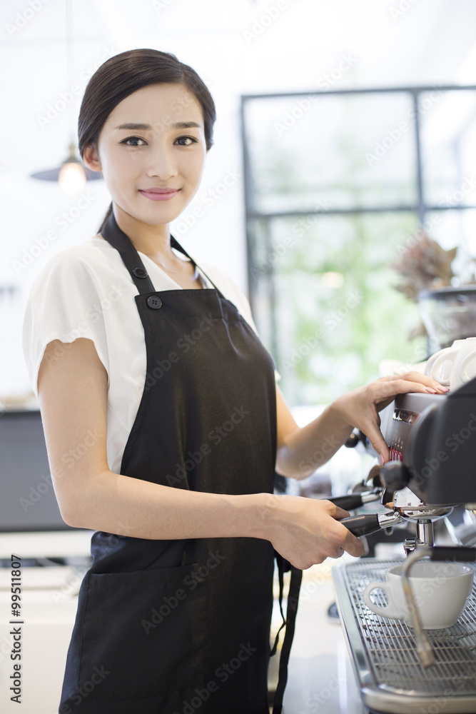 Barista making coffee