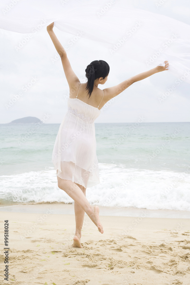 Portrait of young woman at the beach