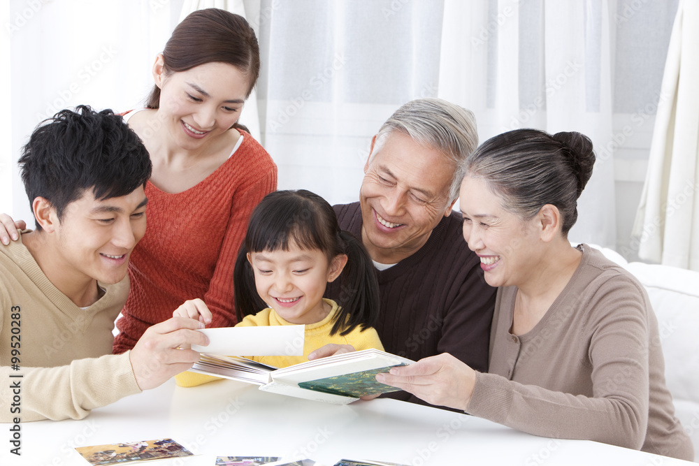 Family looking through family album