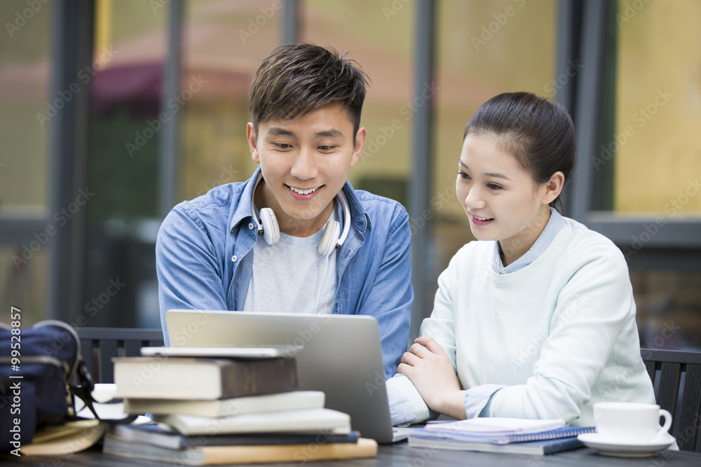 Young couple studying