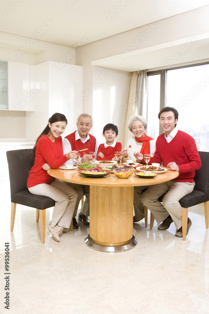 Three generations enjoying a Chinese New Year dinner together