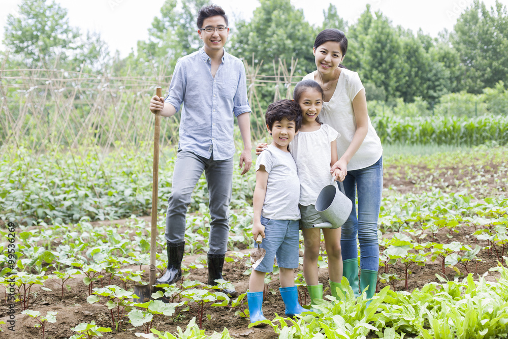 Young family gardening together