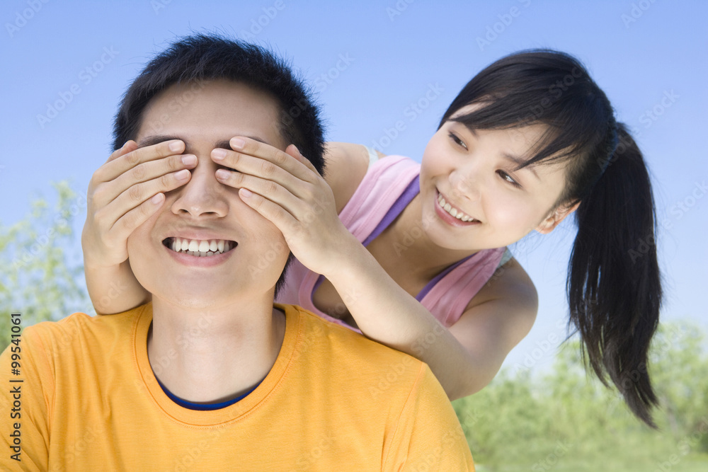 Portrait of a young couple at the park