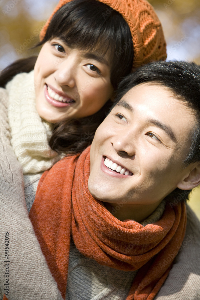 Young Couple Enjoying a Park in Autumn