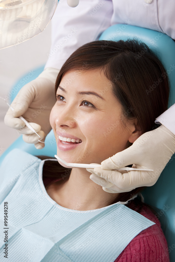 Patient receiving treatment in dental clinic