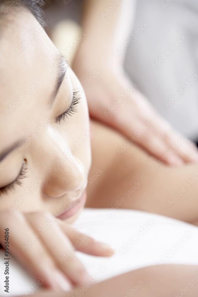 Woman Receiving A Back Massage