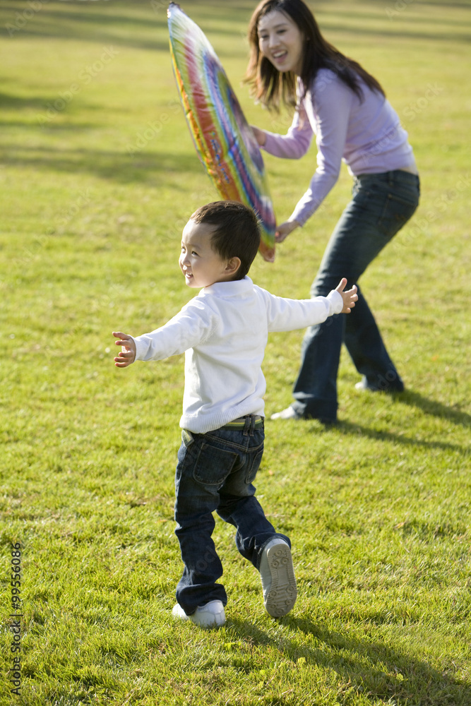 Portrait of mother and son at the park