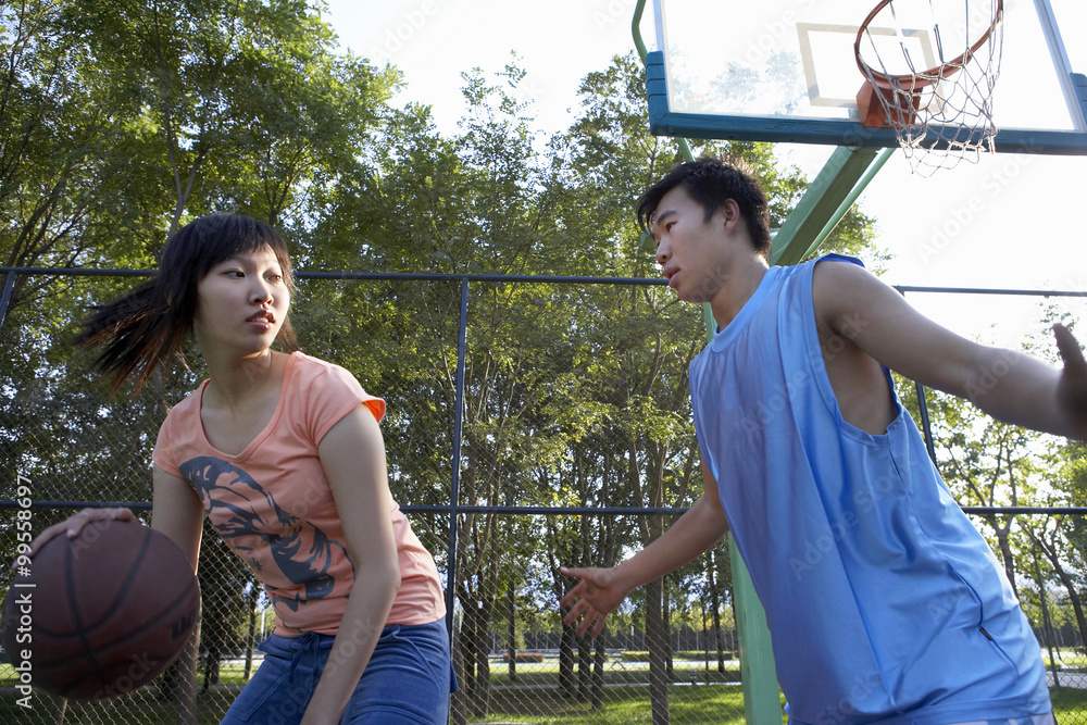 Young People Playing Basketball