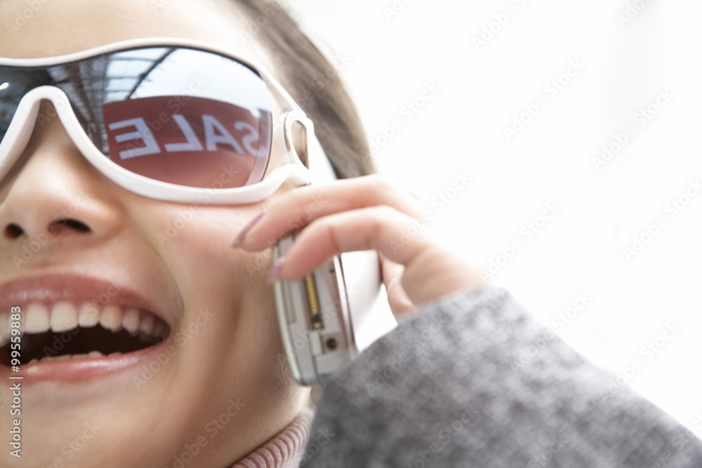 Close-Up Of Woman Talking On Cellphone