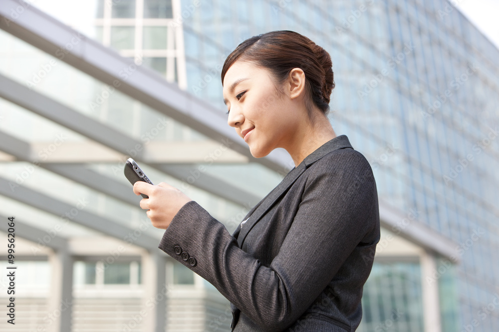 Businesswoman with cellphone