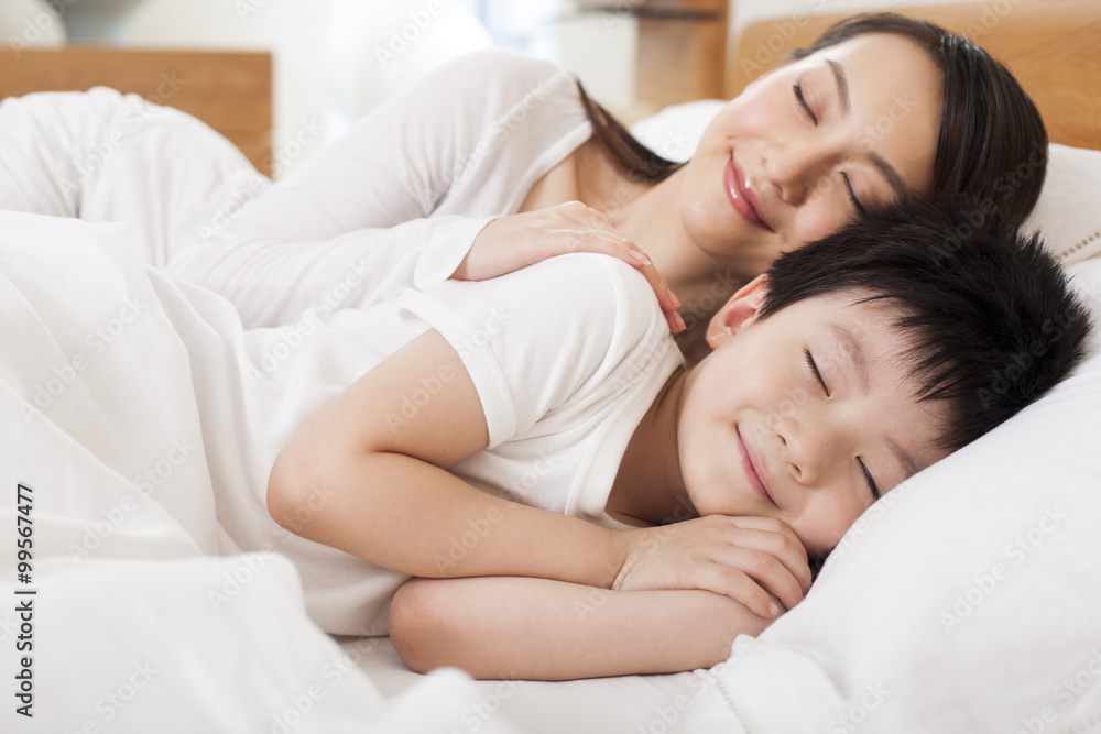 Mother and son in sweet dreams