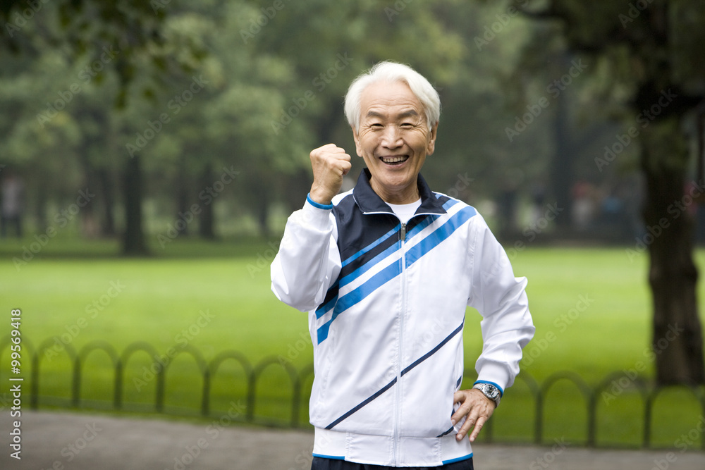 Senior Man Wearing a Tracksuit in a Park