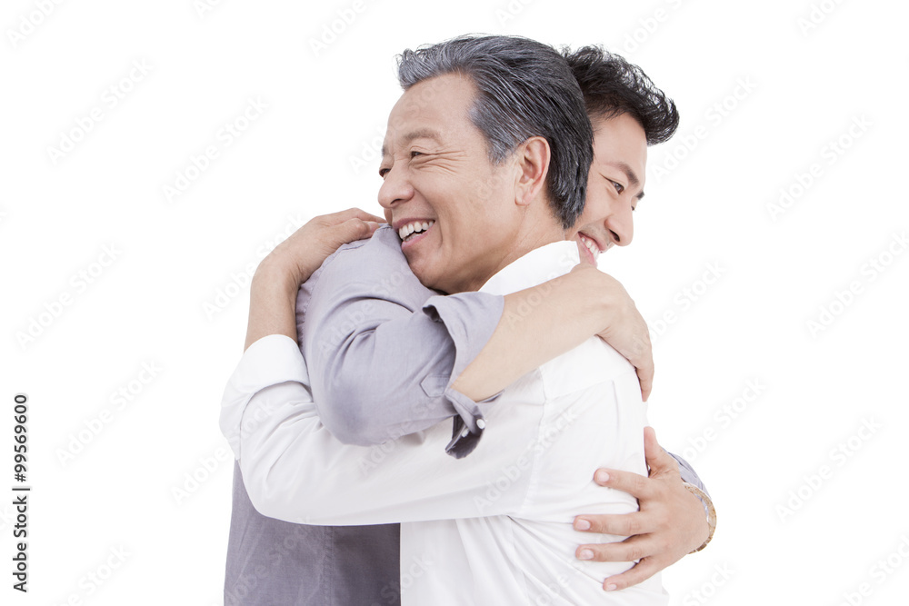 Father and son embracing