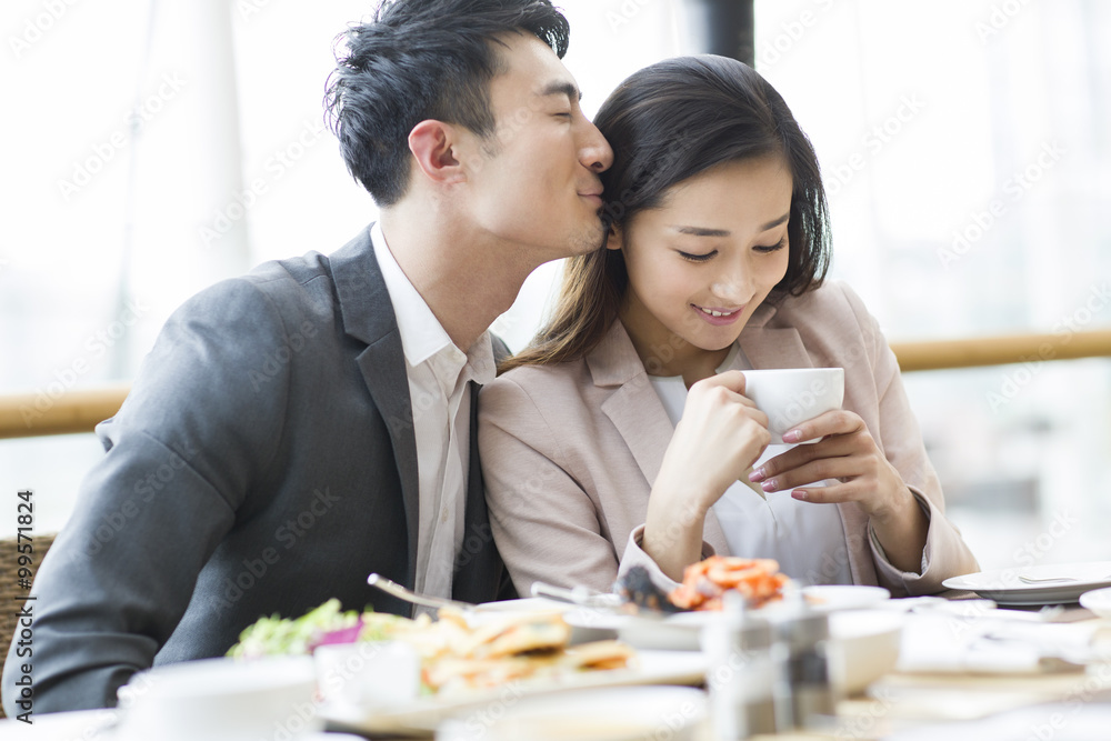 Young couple dining in restaurant