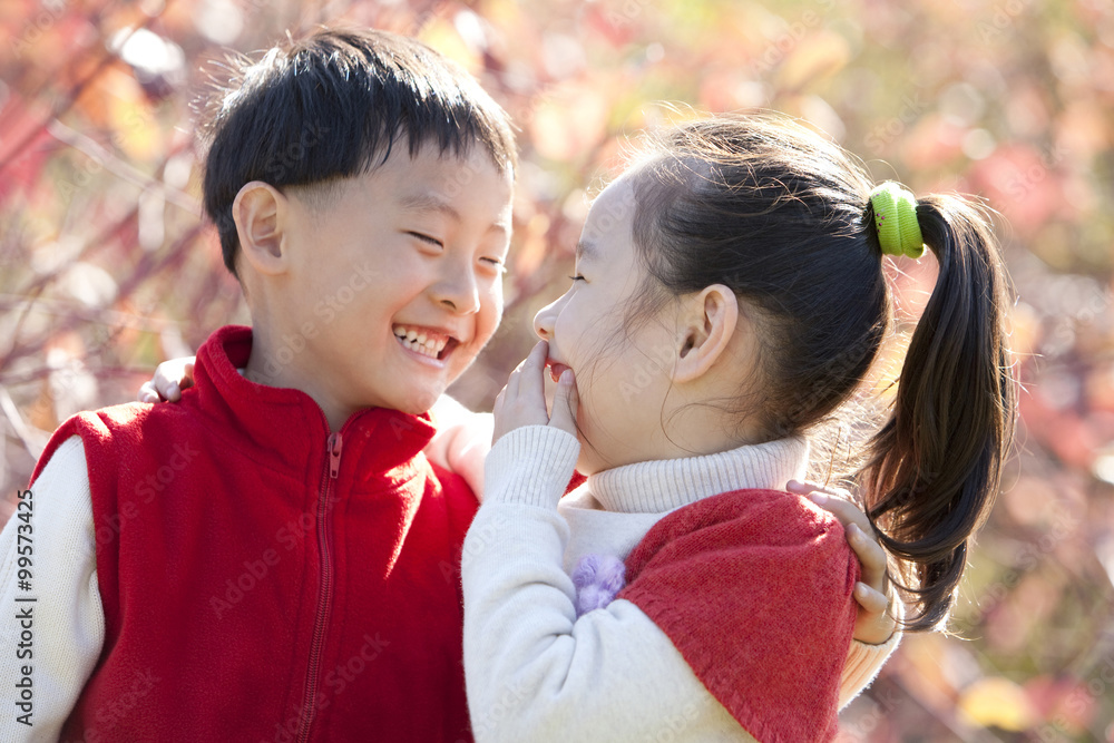 Boy and Girl at a Park, Laughing