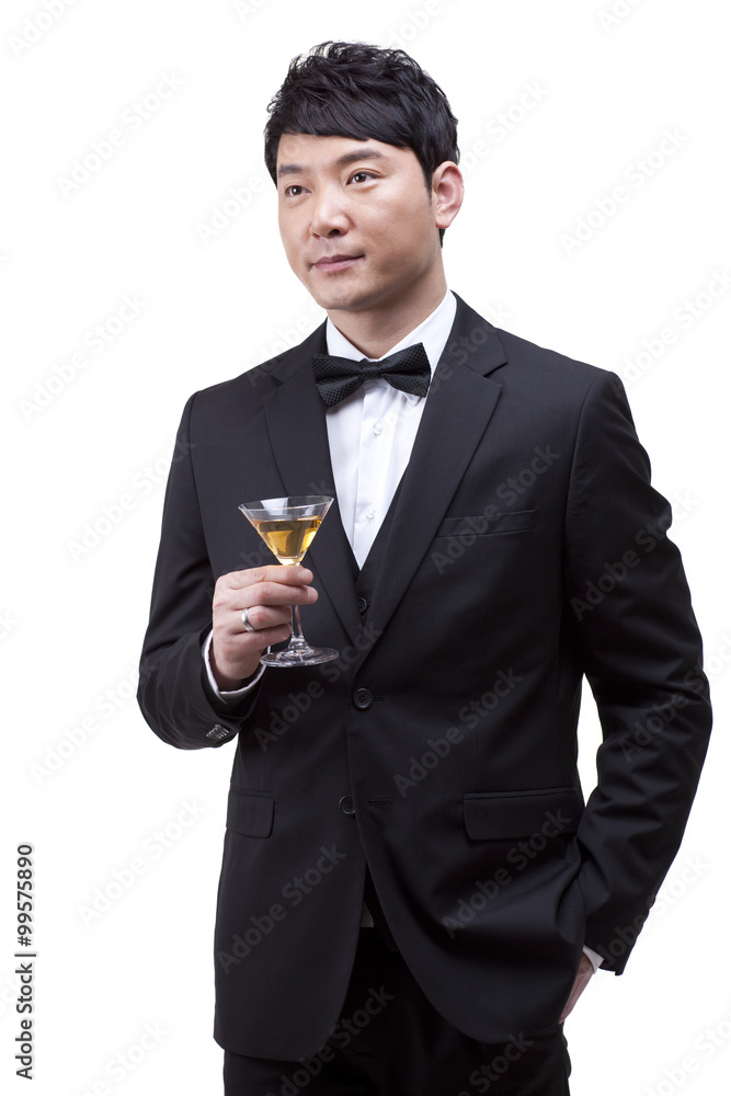 Confident man with cocktail