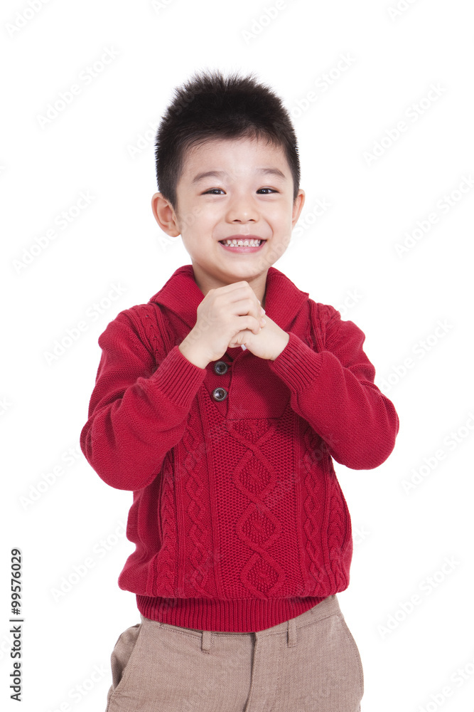 Lively boy congratulating for Chinese New Year