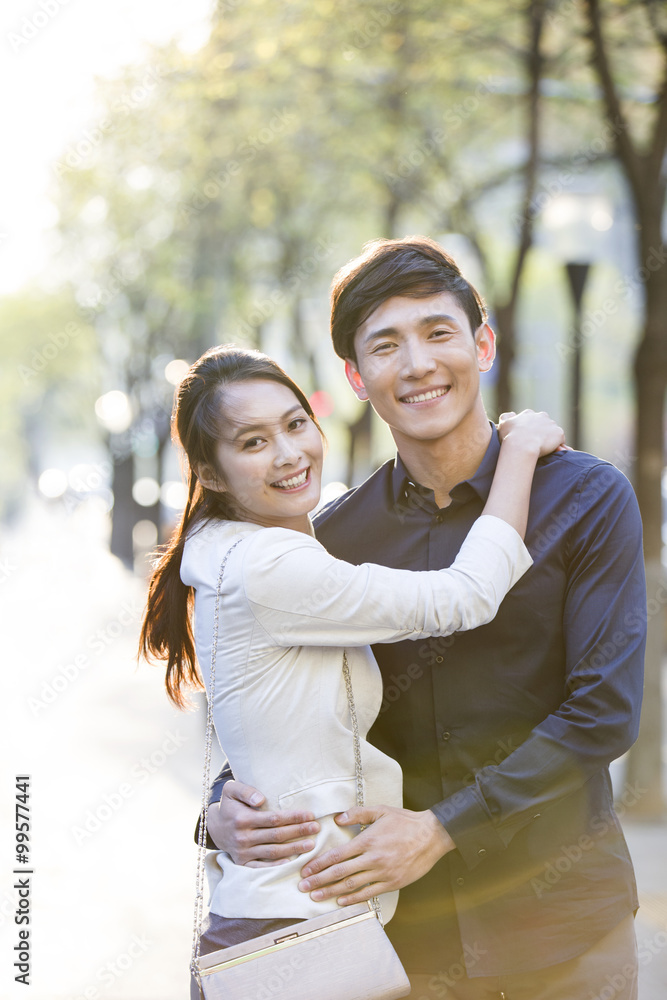 Happy young couple embracing