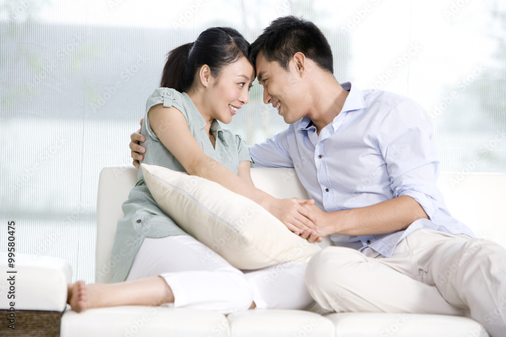 Portrait of a couple relaxing on the couch