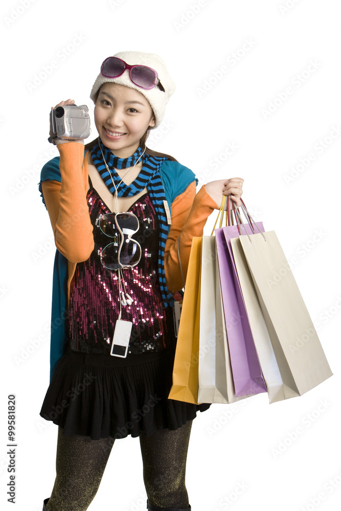 Young woman busy shopping