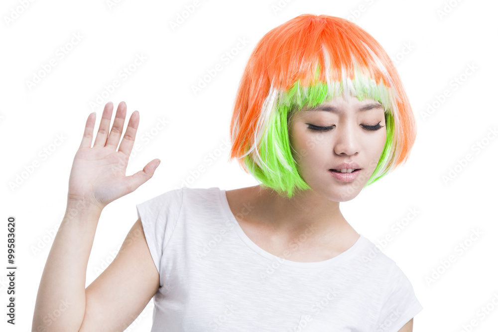 Young woman with colorful wigs