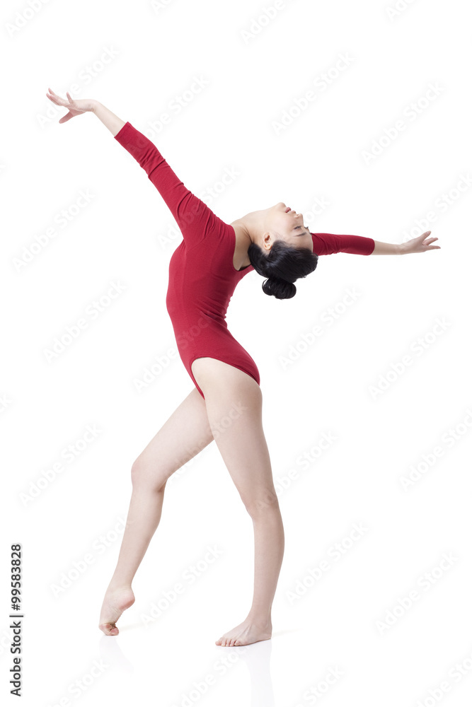 Female gymnast performing rhythmic gymnastics