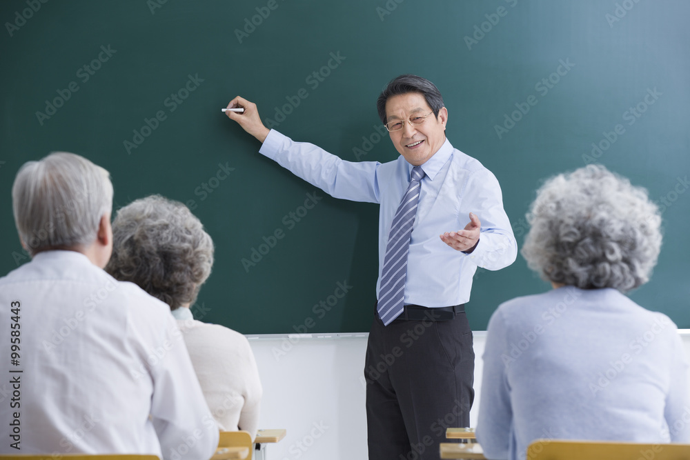 Senior adults having class at school