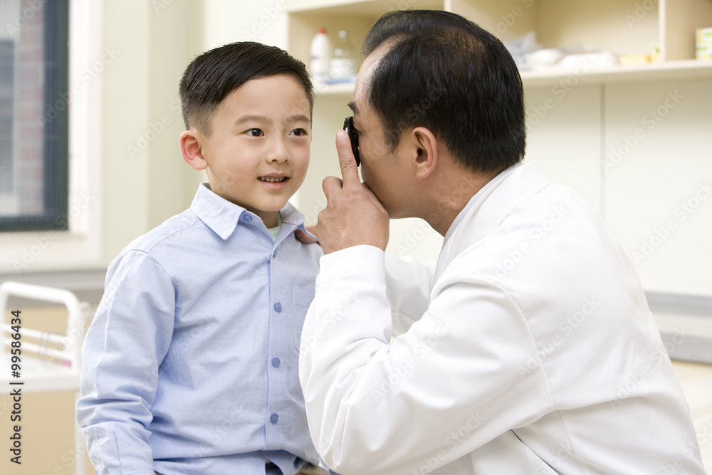 Young Boy is Examined by a Doctor