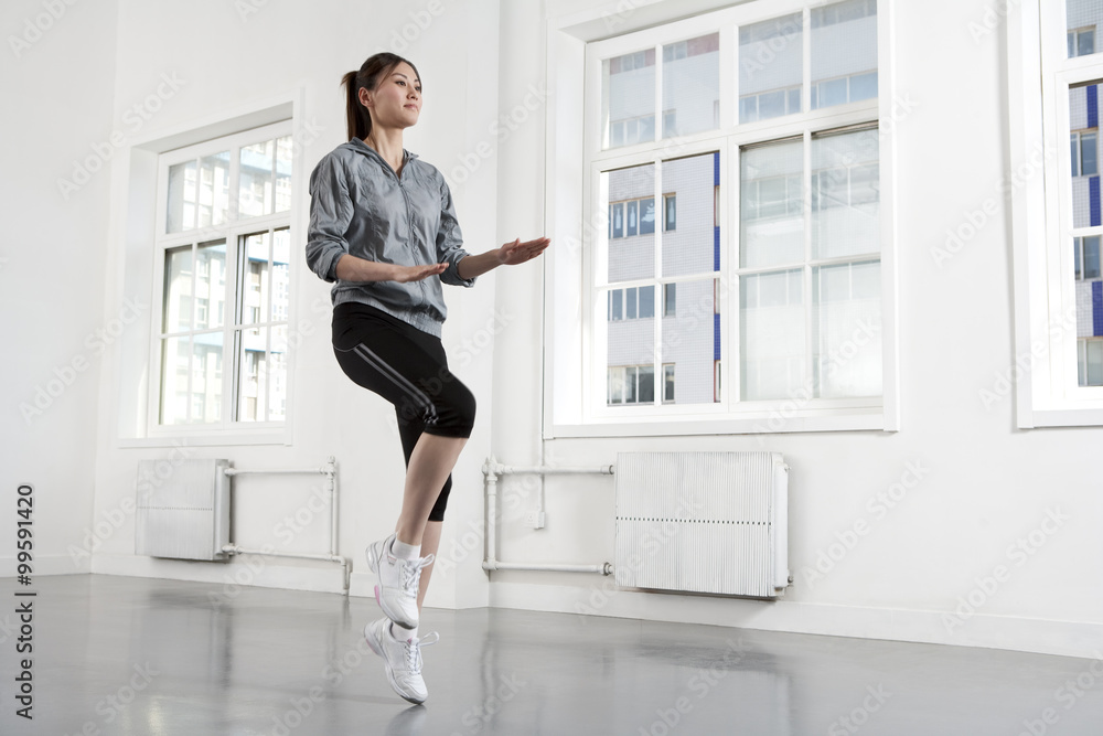 Young Woman Running in Place