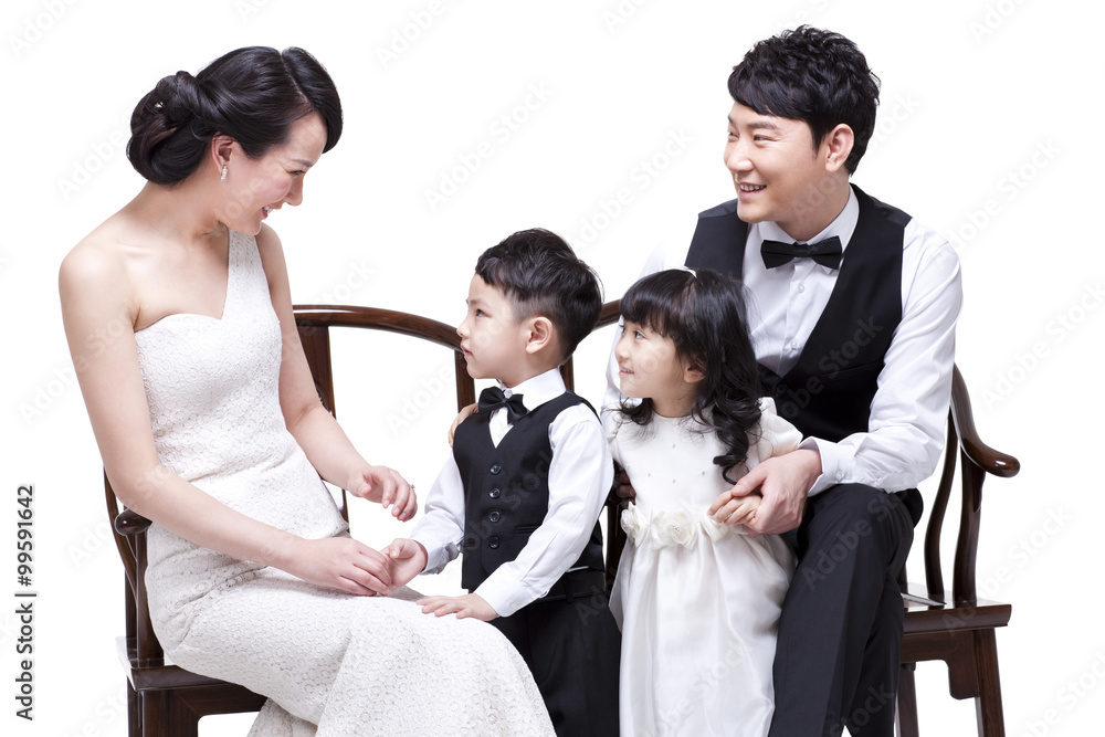 Cheerful young family face to face talking