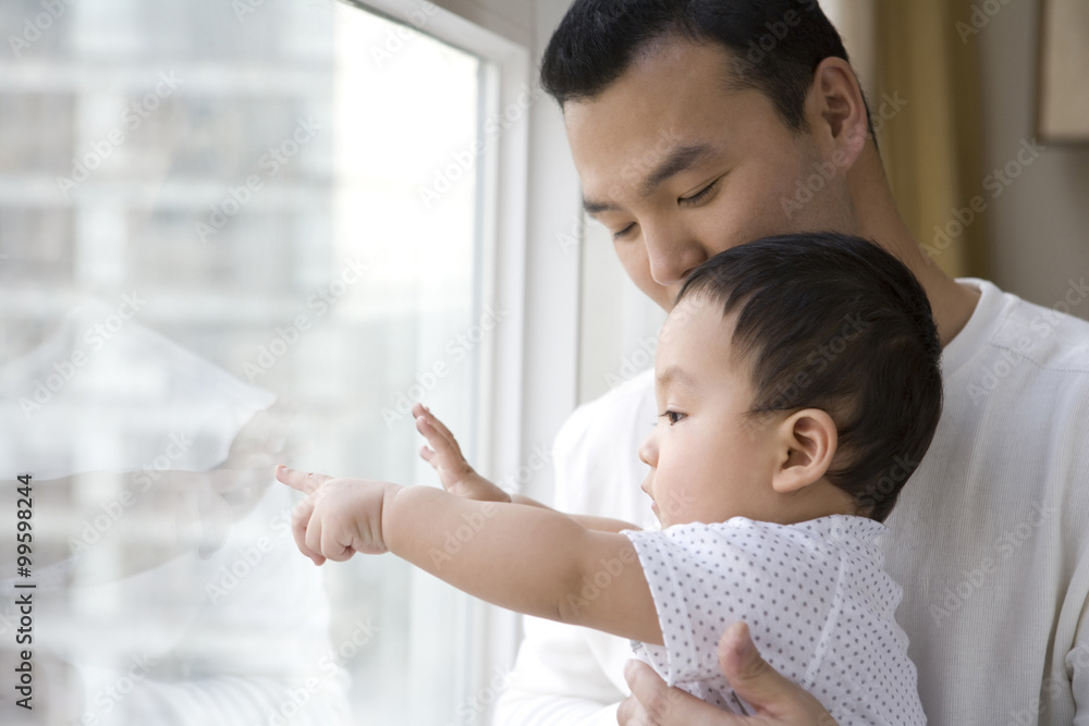 Man with infant