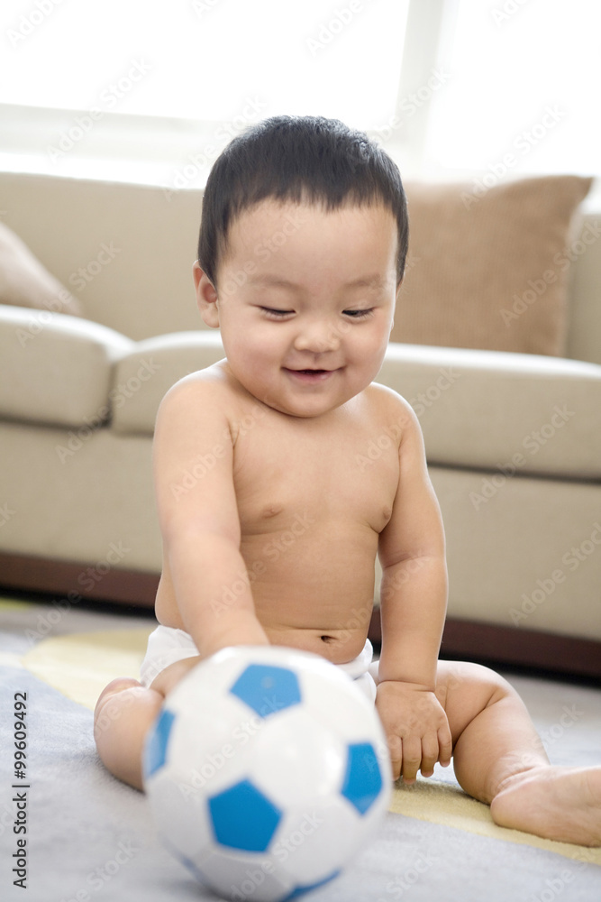 Infant with soccer ball