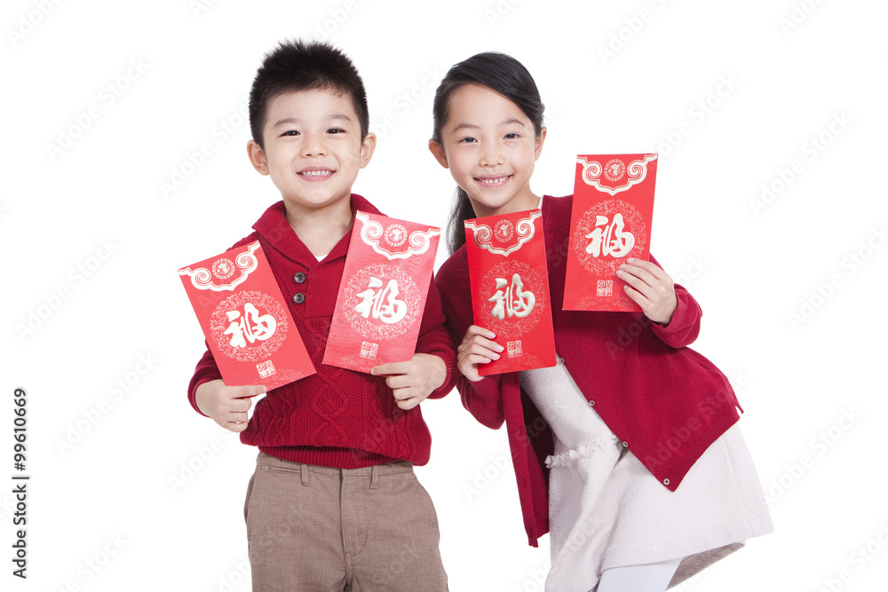 Cheerful boy and girl holding red pockets