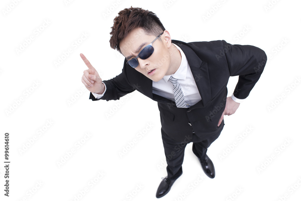 Cool businessman raising finger up