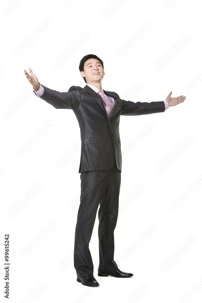 Full length of businessman with arms outstretched